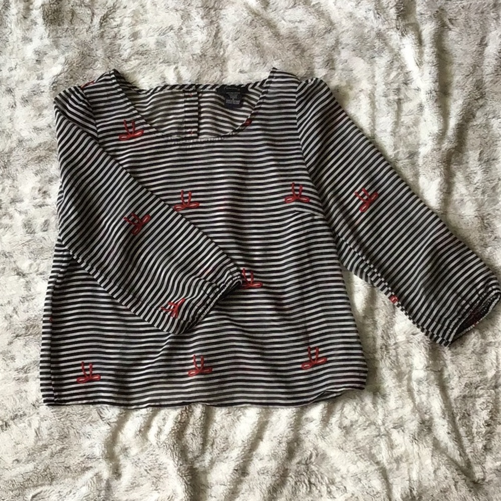 Black, white and red blouse with cute buttons!